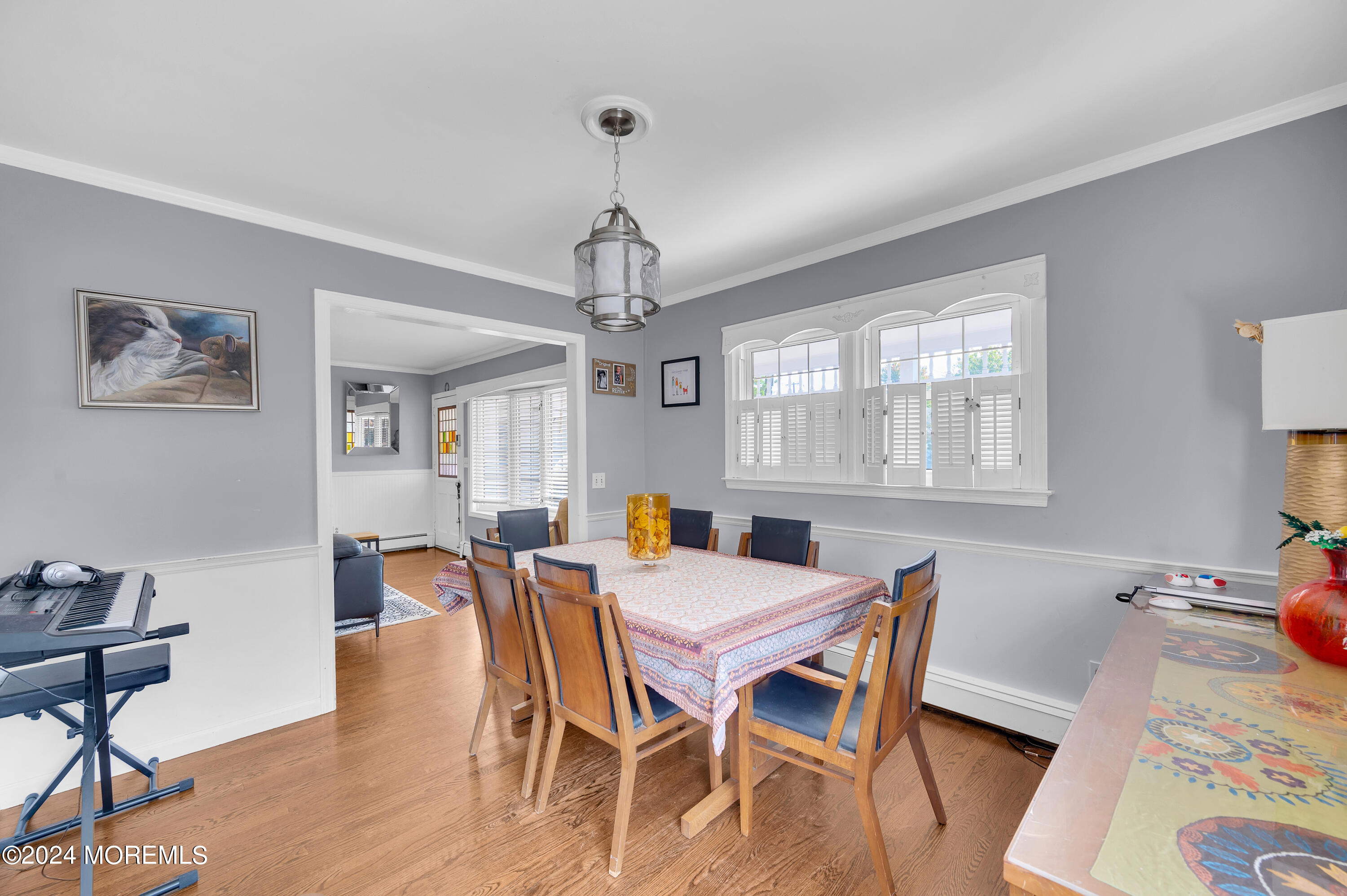 3503 River Road Point Pleasant, NJ 08742 - Photo 12 of 21 a view of a dining room with furniture window and wooden floor