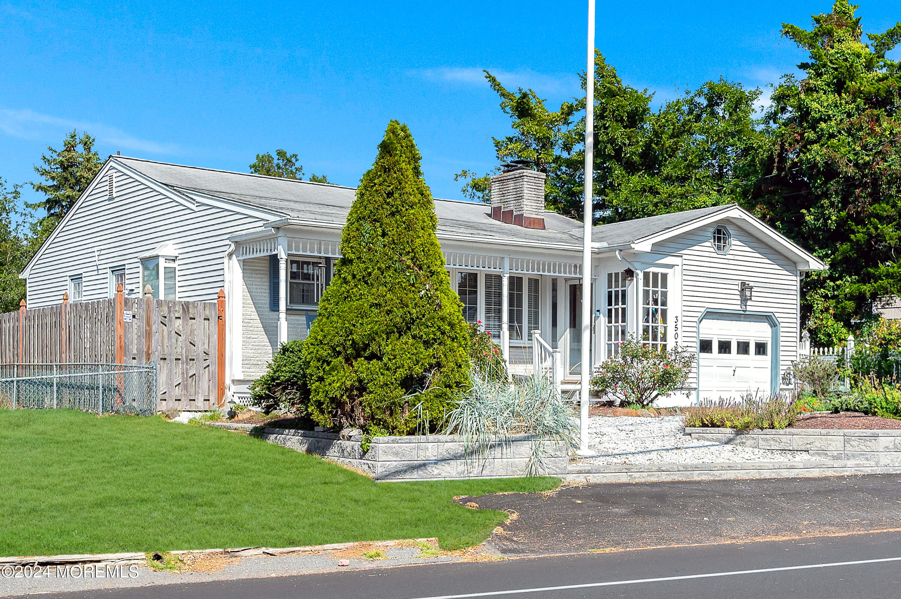 3503 River Road Point Pleasant, NJ 08742 - Photo 3 of 21 a front view of a house with a yard