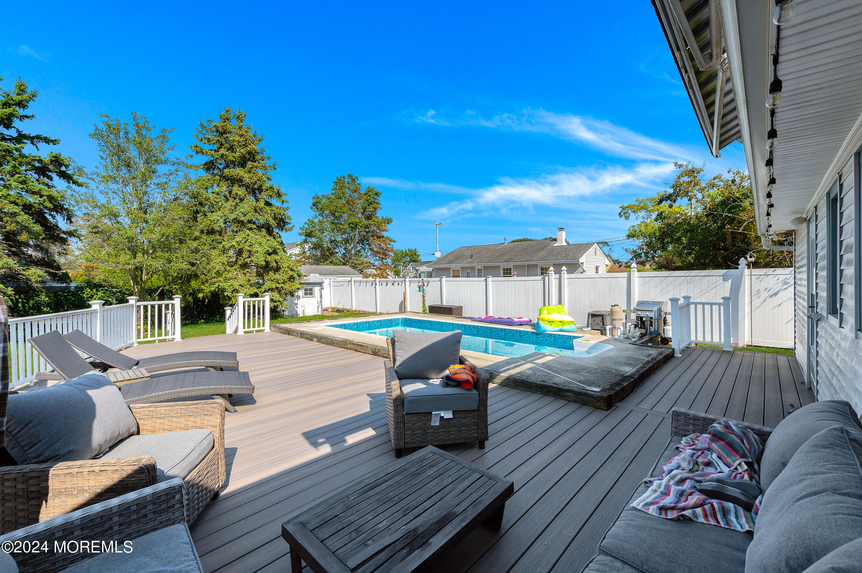 3503 River Road Point Pleasant, NJ 08742 - Photo 6 of 21 a view of a patio with couches chairs and potted plants
