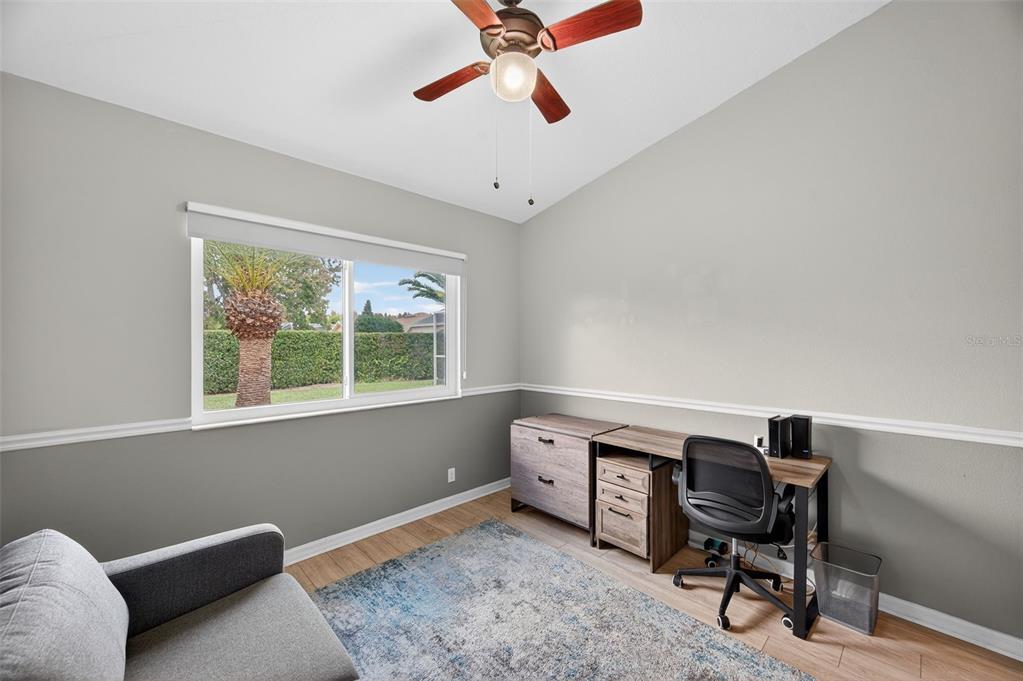 10539 Gooseberry Court Trinity, FL 34655 - Photo 25 of 52 a view of a workspace with furniture and a window