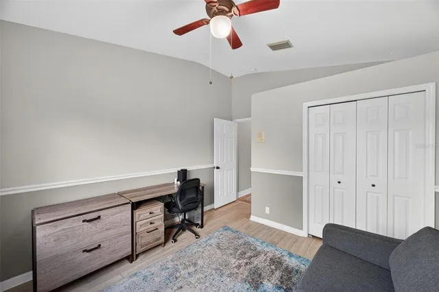 a utility room with dryer washer and sink