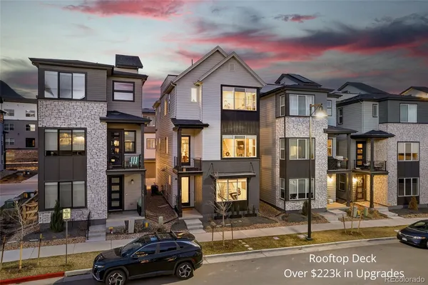 a car parked in front of a houses
