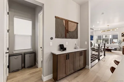 a view of a living room and dining room