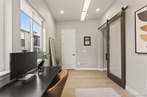 a view of a hallway with workspace
