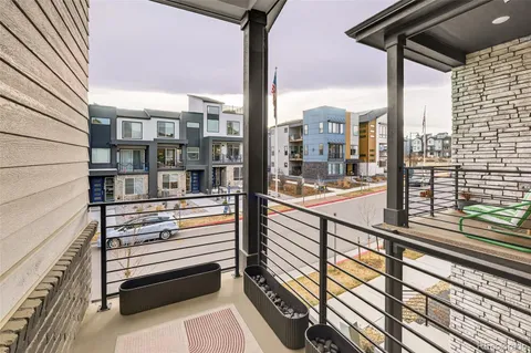 a view of a balcony with city view