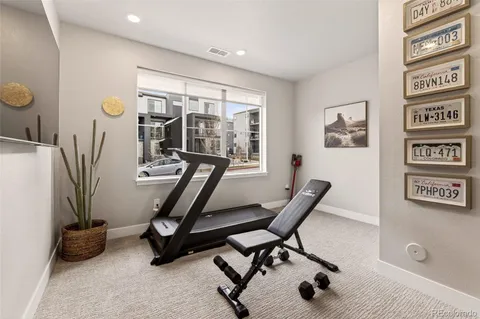 a view of a livingroom with furniture and windows