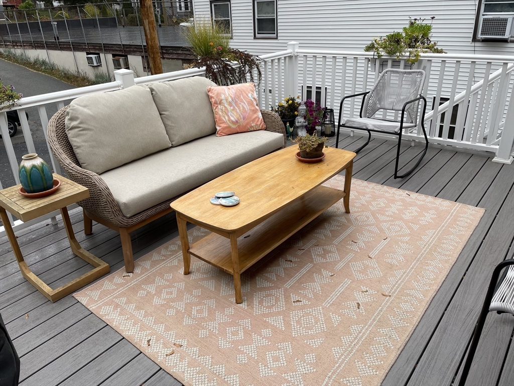 13 High Street, Unit 2 Amesbury, MA 01913 - Photo 2 of 16 a view of a terrace with furniture