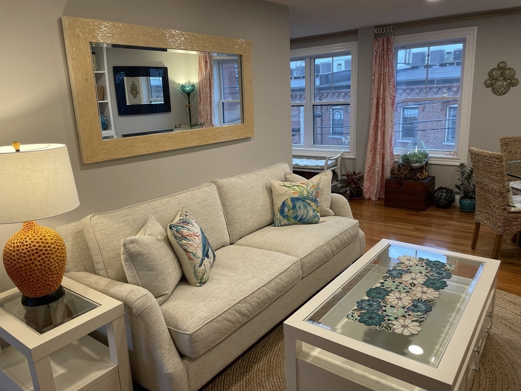 13 High Street, Unit 2 Amesbury, MA 01913 - Photo 9 of 16 a living room with furniture and a rug