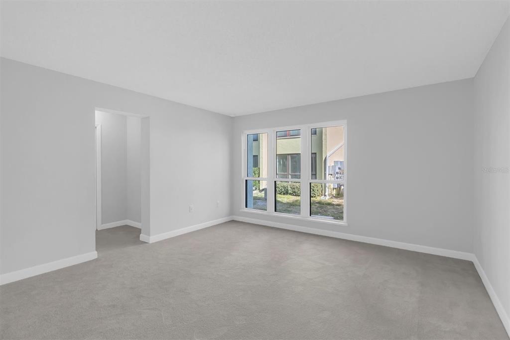1 Windrush Boulevard, Unit 87 Indian Rocks Beach, FL 33785 - Photo 15 of 54 a view of an empty room with a window