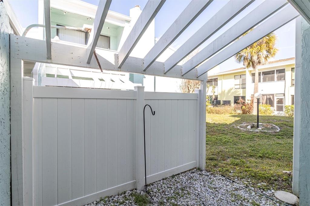 1 Windrush Boulevard, Unit 87 Indian Rocks Beach, FL 33785 - Photo 32 of 54 a utility room with washer and dryer