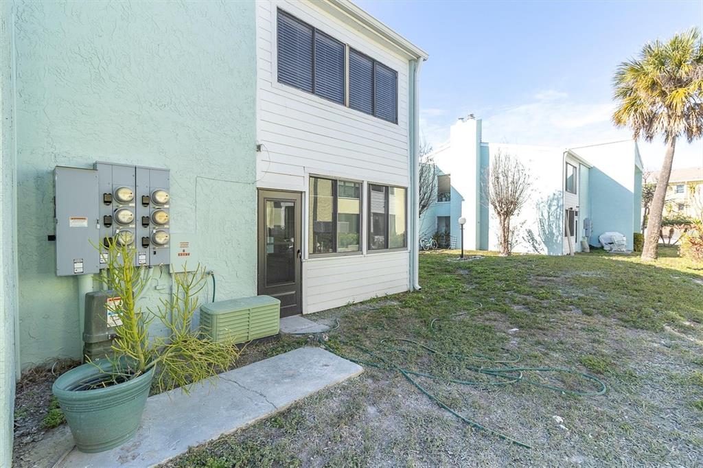 1 Windrush Boulevard, Unit 87 Indian Rocks Beach, FL 33785 - Photo 33 of 54 a house view with a outdoor space