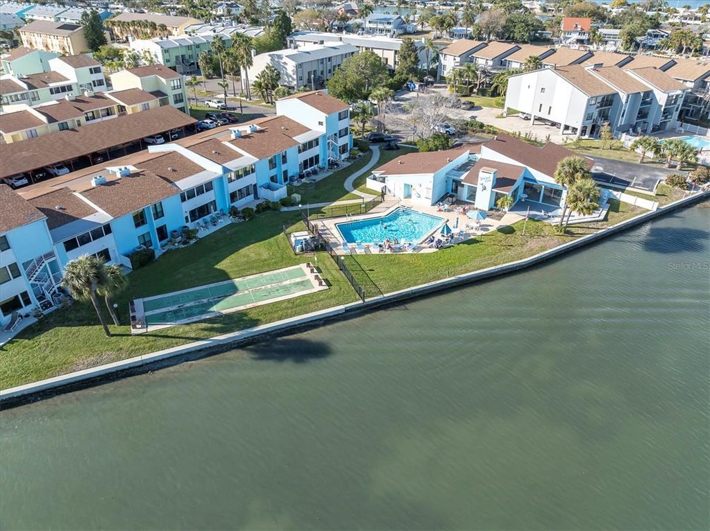1 Windrush Boulevard, Unit 87 Indian Rocks Beach, FL 33785 - Photo 41 of 54 an aerial view of residential houses with outdoor space