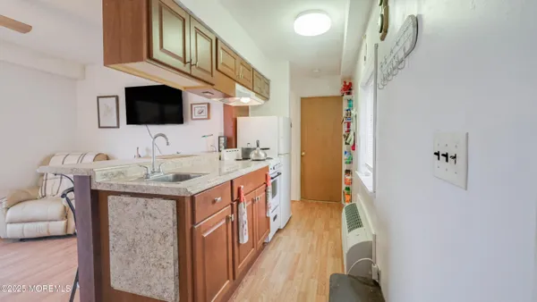 a bathroom with a sink a mirror and a bathtub