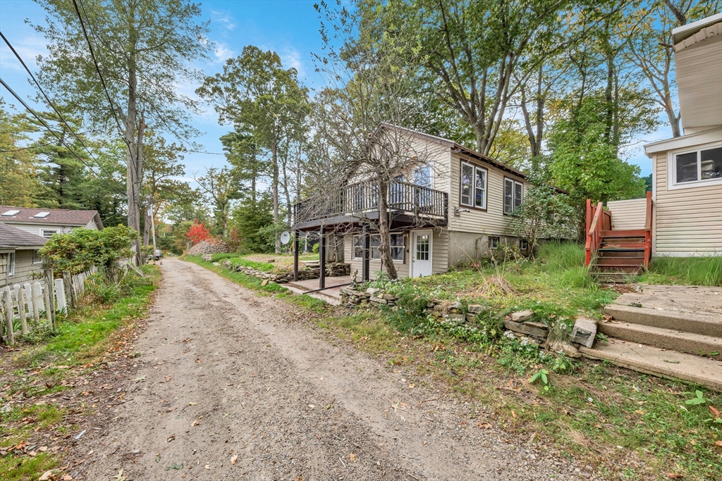 4 Stevens Way Rutland, MA 01543 - Photo 40 of 42 a view of a house with a yard and sitting area