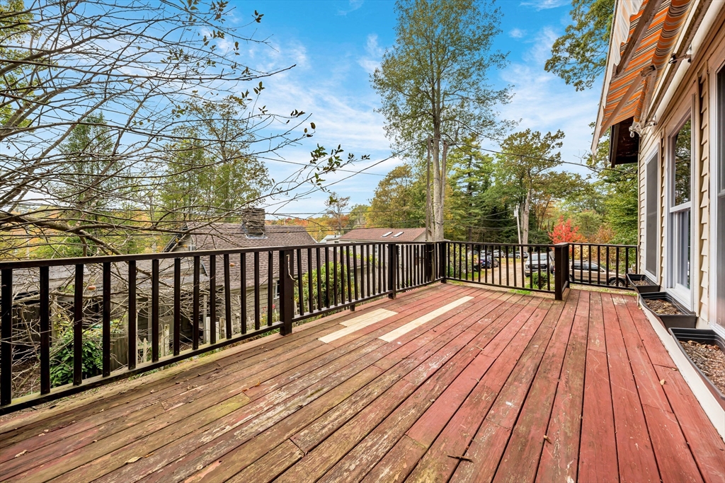 4 Stevens Way Rutland, MA 01543 - Photo 7 of 42 a view of wooden balcony with a pot