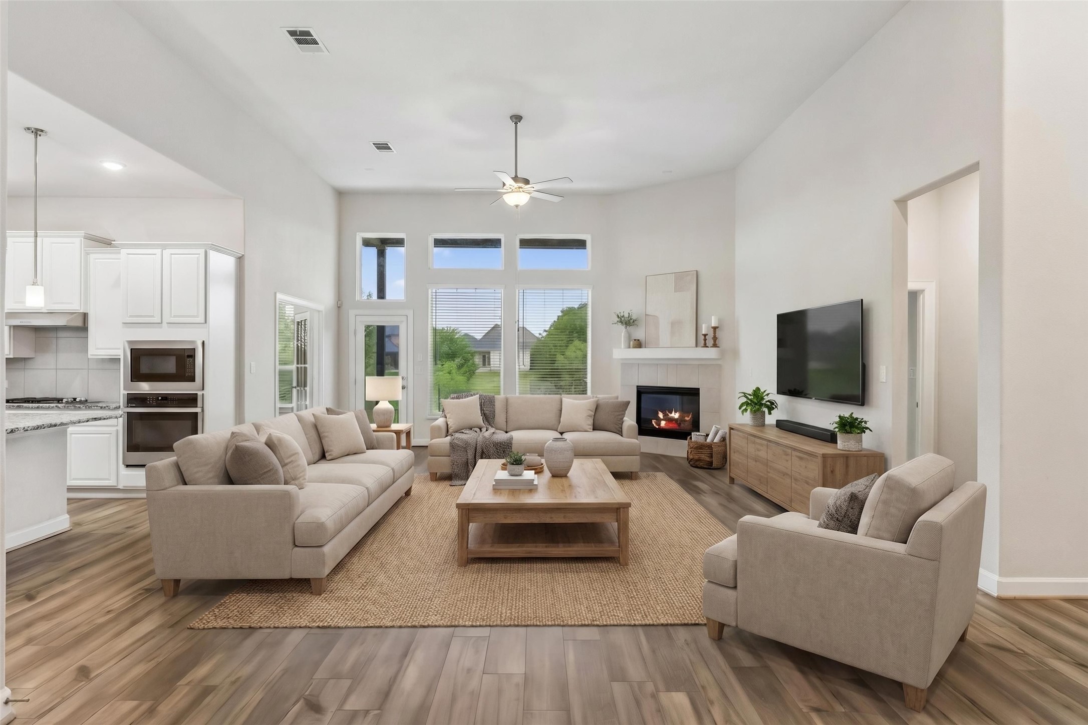 298 Wild Pecan Loop Buda, TX 78610 - Photo 2 of 40 a living room with furniture fireplace and flat screen tv