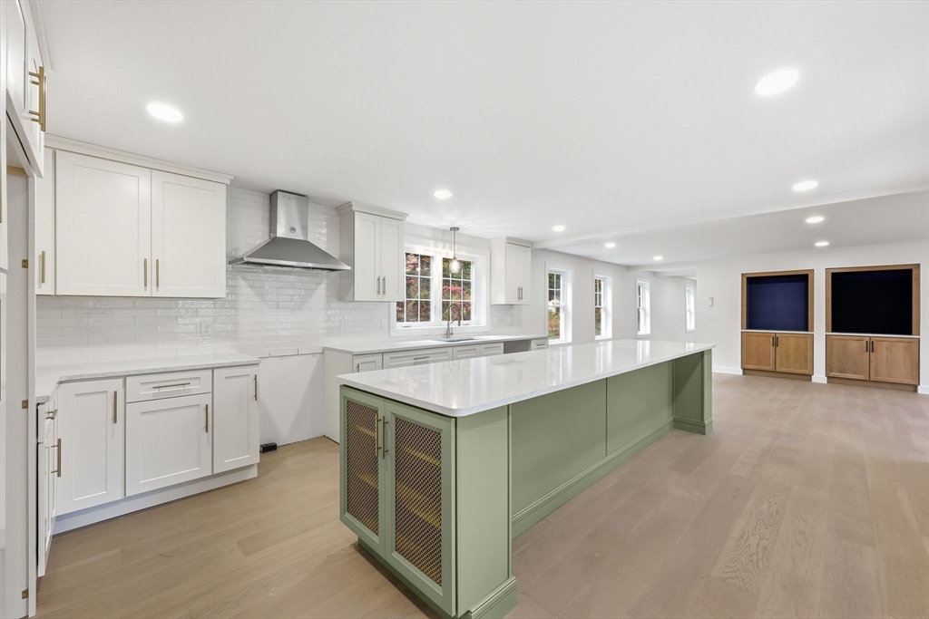 75 Lead Mine Road Southampton, MA 01073 - Photo 17 of 42 a large kitchen with stainless steel appliances granite countertop a large counter top a sink and a stove