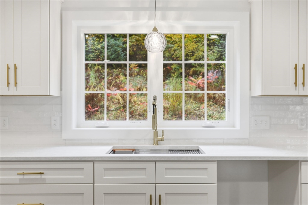 75 Lead Mine Road Southampton, MA 01073 - Photo 19 of 42 a kitchen with a sink and a window