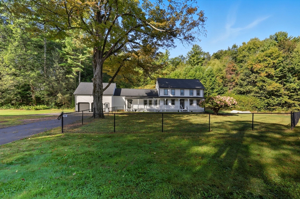 75 Lead Mine Road Southampton, MA 01073 - Photo 3 of 42 a view of a house with a yard