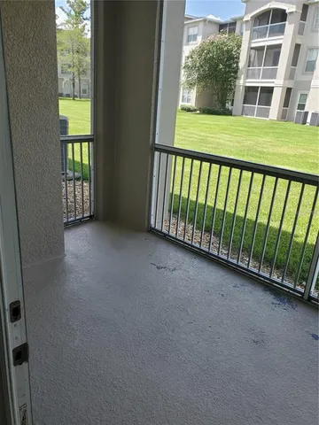 a view of a balcony with an outdoor space