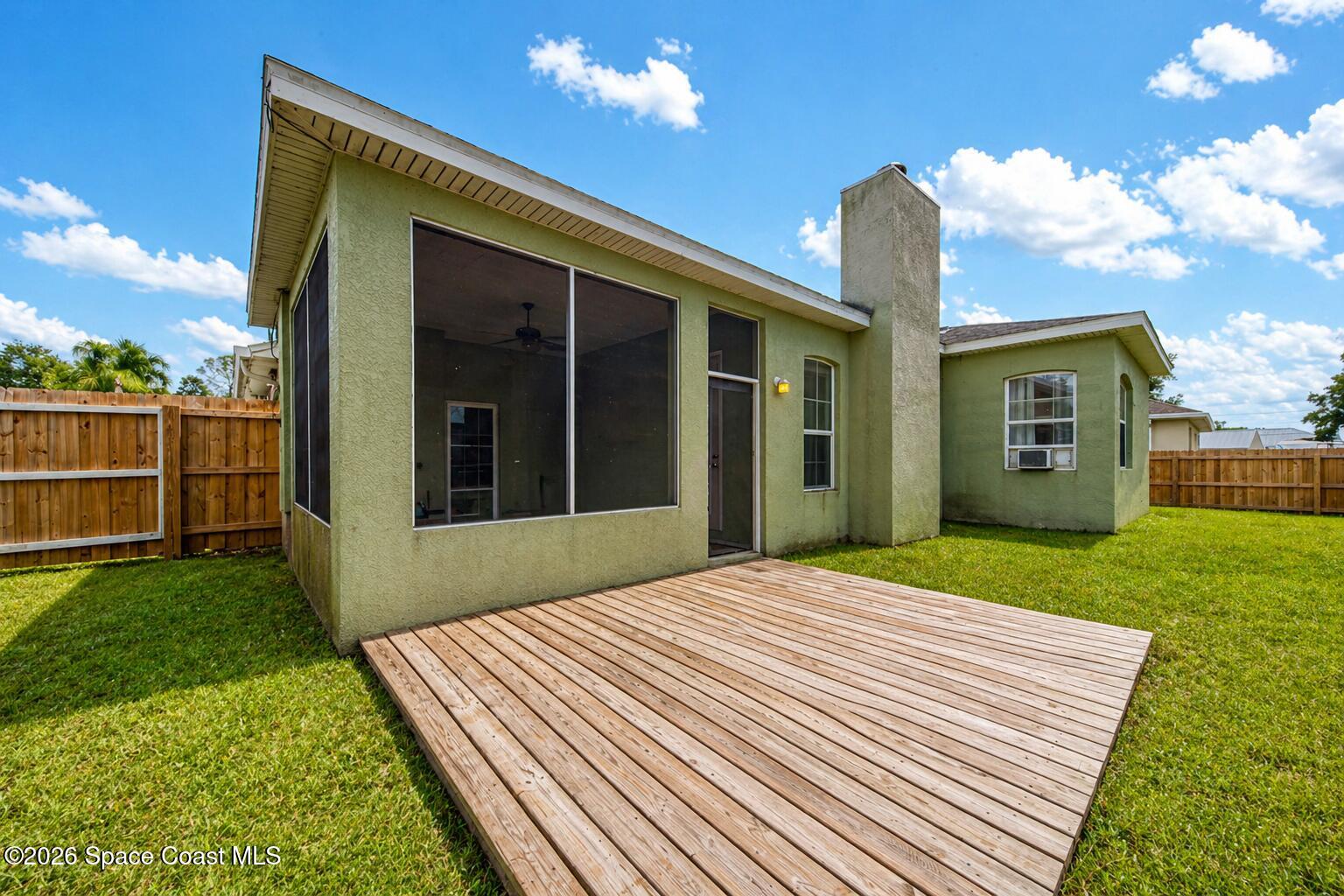 1090 Castile Road Southeast Palm Bay, FL 32909 - Photo 18 of 22 backyard 2