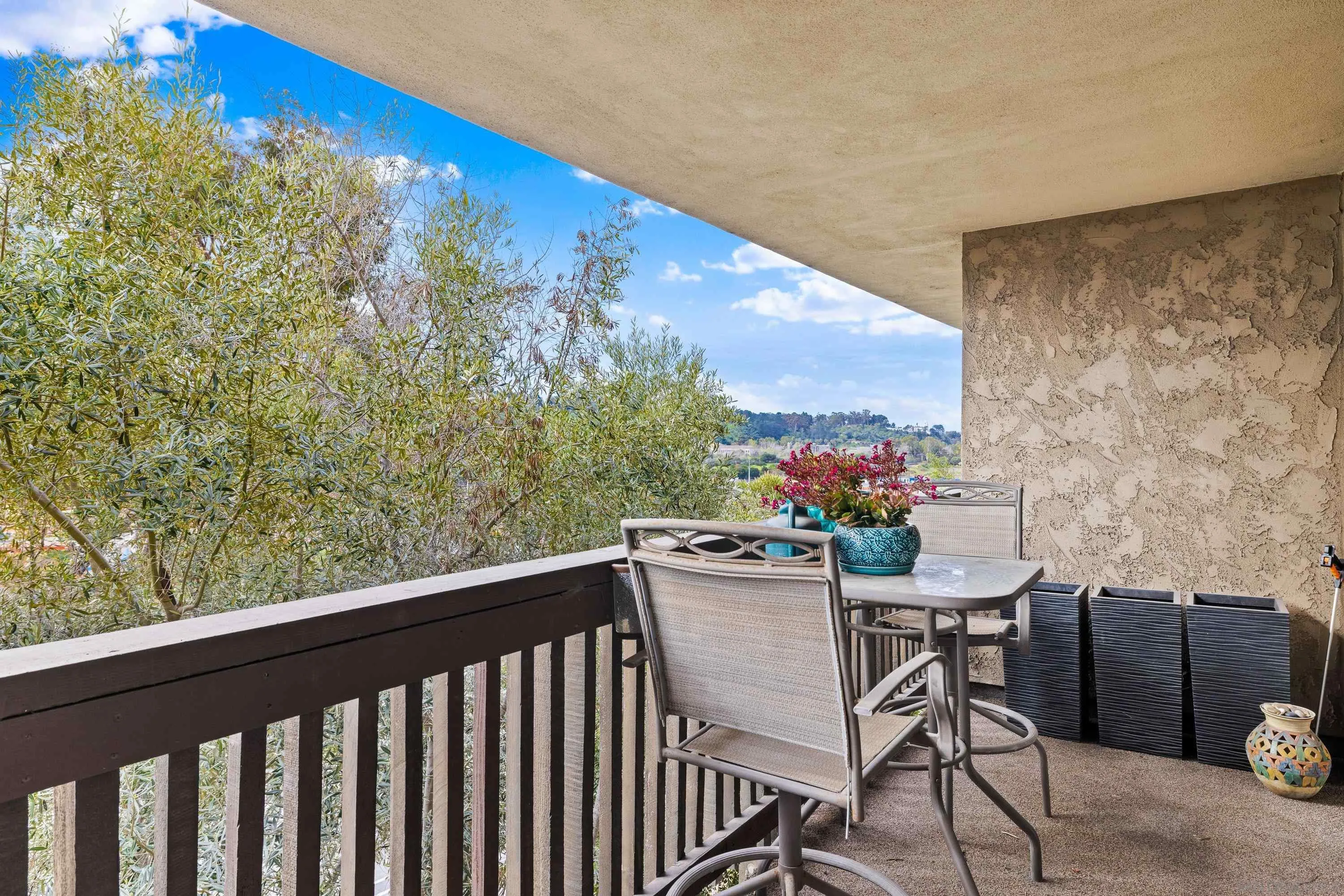 6406 Friars Road, Unit 338 San Diego, CA 92108 - Photo 14 of 36 a view of a chairs and table in the balcony