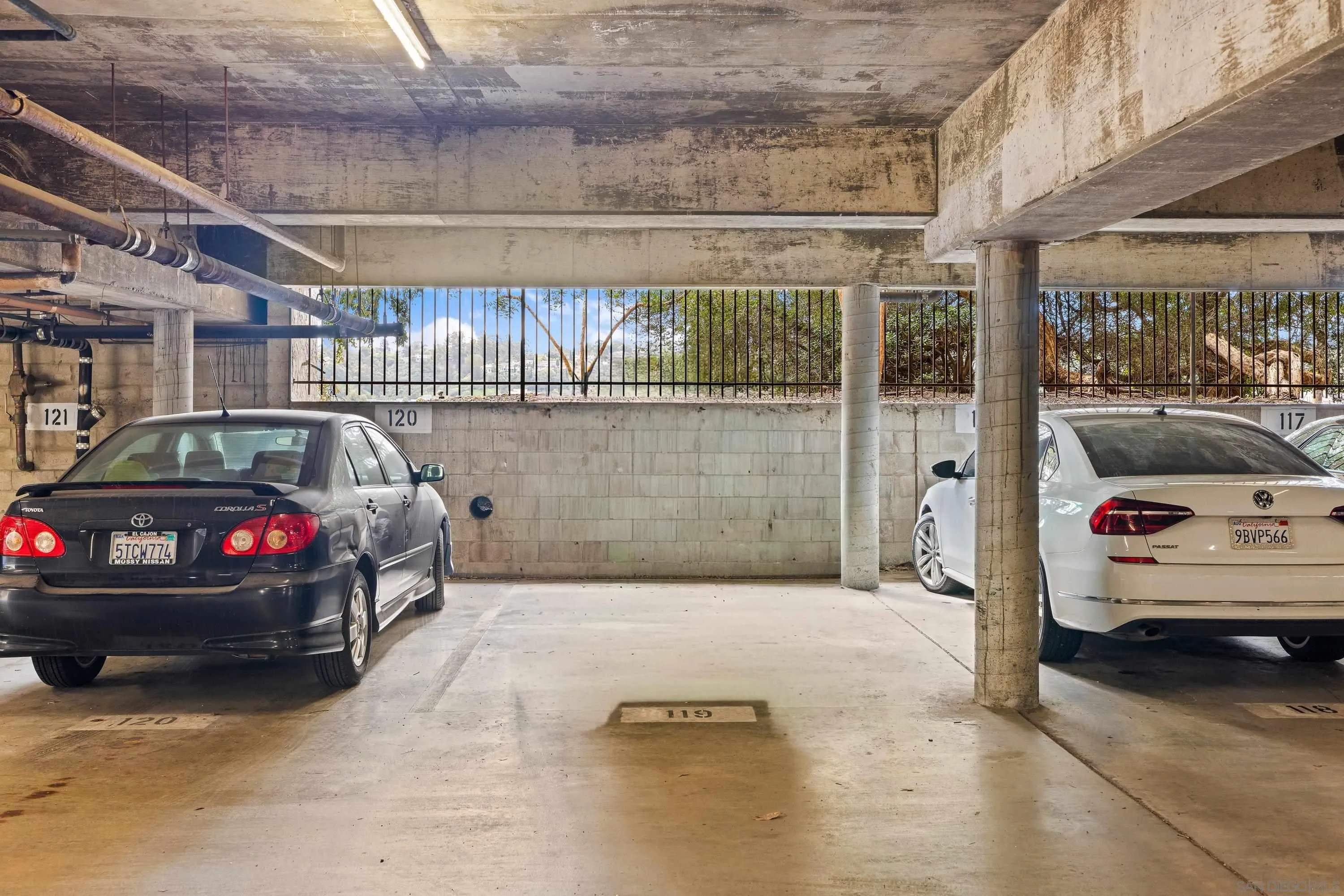 6406 Friars Road, Unit 338 San Diego, CA 92108 - Photo 34 of 36 a view of a cars park in front of a building