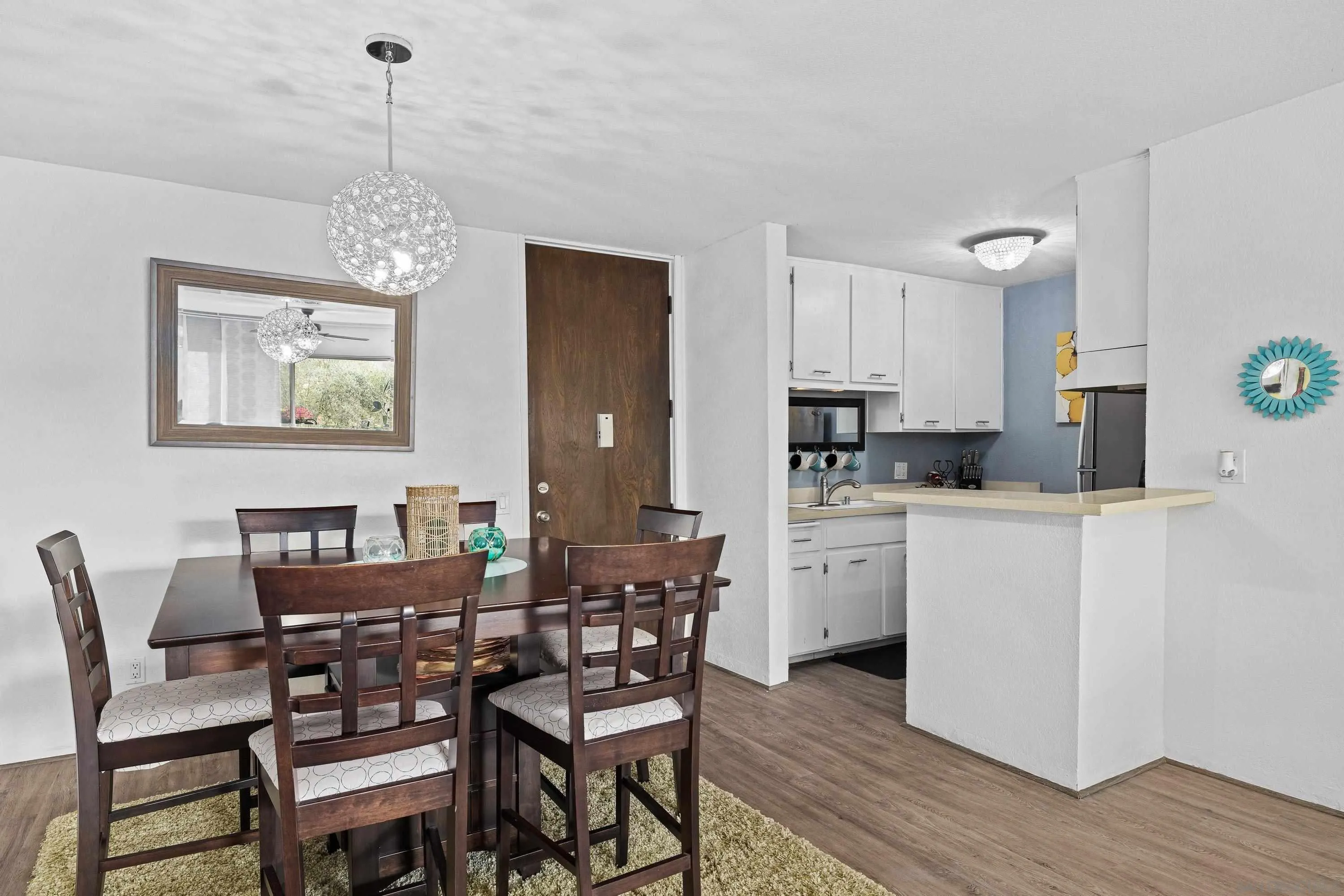 6406 Friars Road, Unit 338 San Diego, CA 92108 - Photo 5 of 36 a dining room with furniture and window