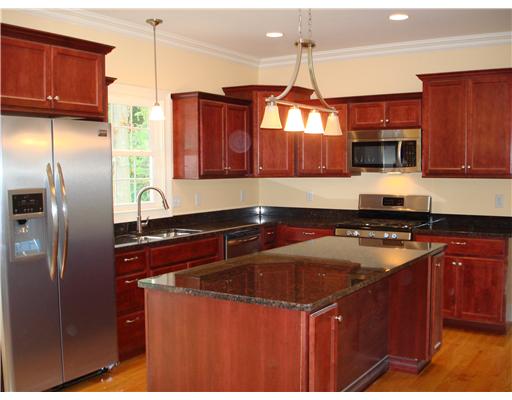 690 Middle Road East Greenwich, RI 02818 - Photo 4 of 12 Exterior Front. Xlarge eat in kitchen with granite counters and hardwood floors. Fully applianced with top of the line stainless appliances.crown moldings.
