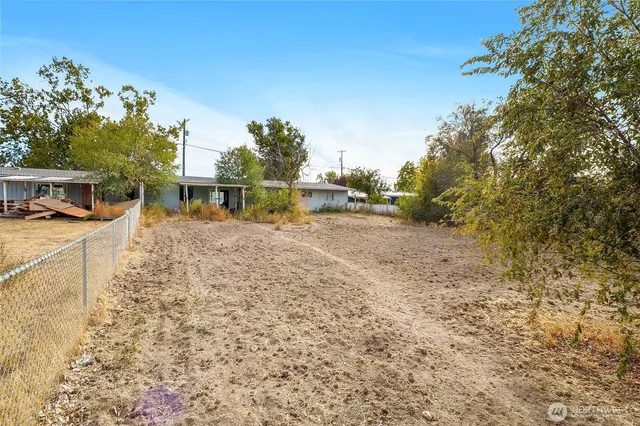 a view of a yard with an outdoor space