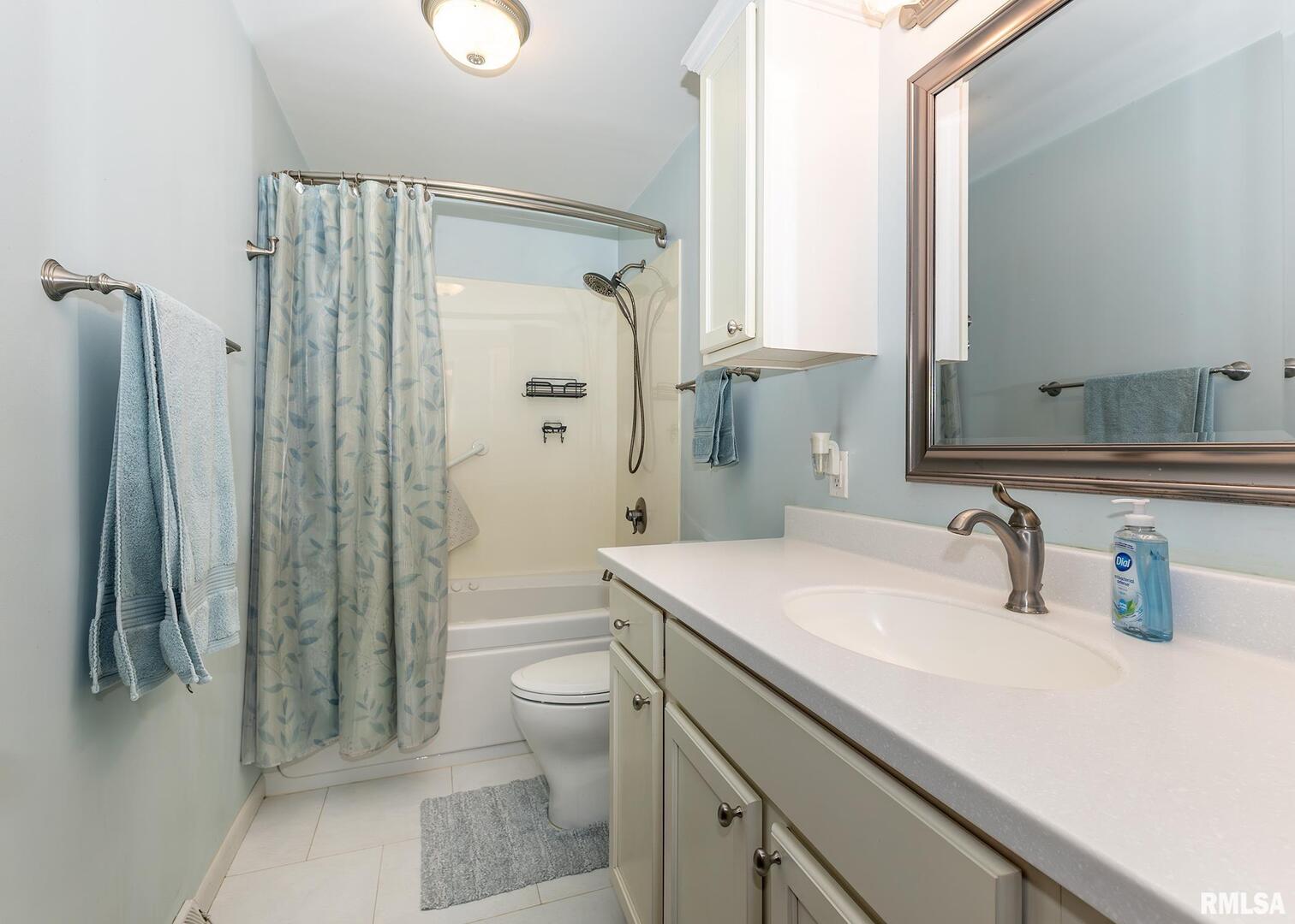 2705 36th Street Rock Island, IL 61201 - Photo 21 of 29 a bathroom with a sink toilet and shower