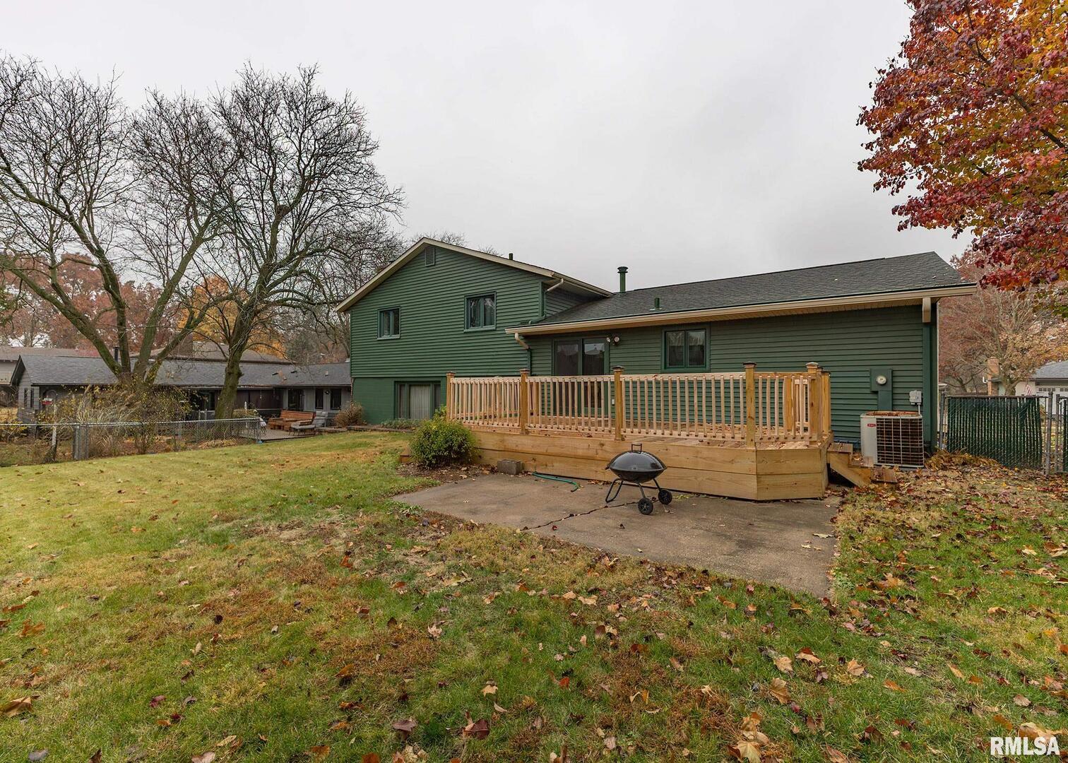 2705 36th Street Rock Island, IL 61201 - Photo 27 of 29 a front view of a house with a yard