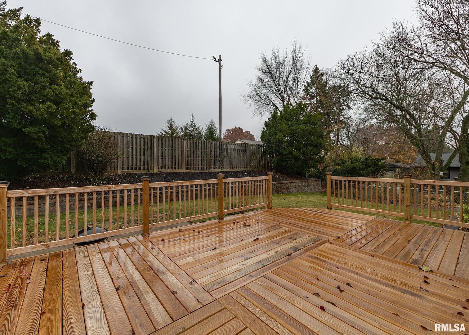 2705 36th Street Rock Island, IL 61201 - Photo 28 of 29 a balcony with view of trees in the background