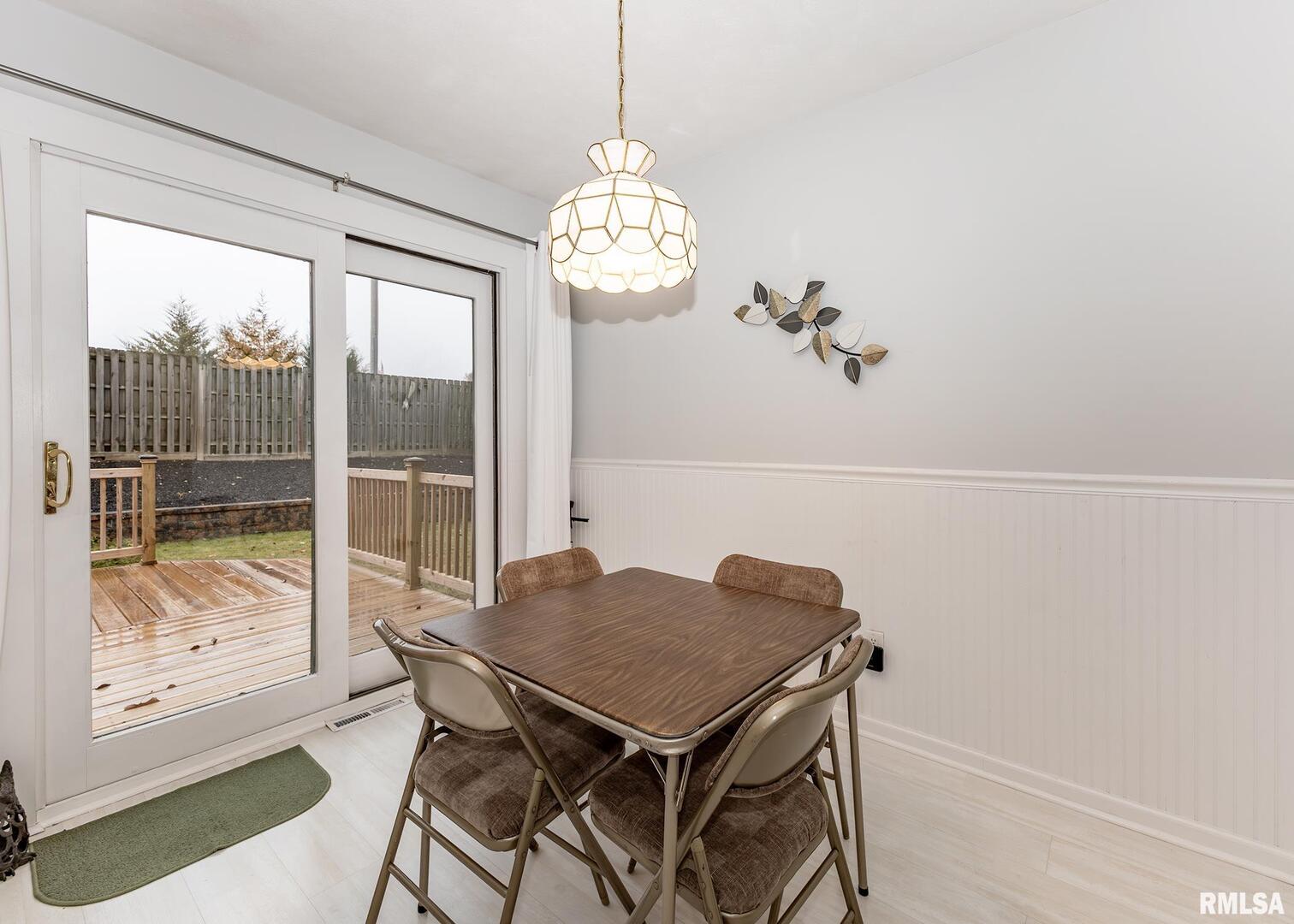 2705 36th Street Rock Island, IL 61201 - Photo 7 of 29 a view of a dining room with furniture window and outside view