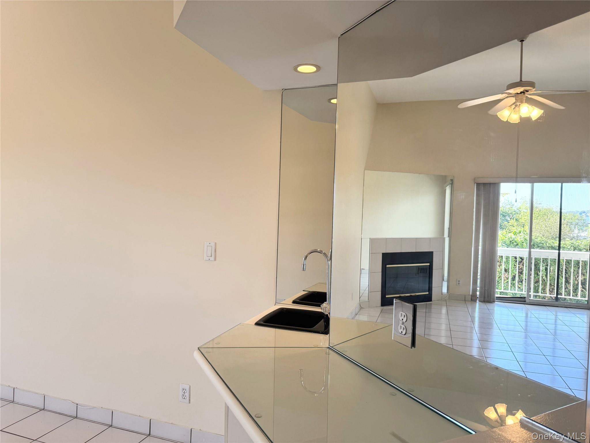 170 Schofield Street, Unit 2F Bronx, NY 10464 - Photo 6 of 11 a kitchen with cabinets and chandelier
