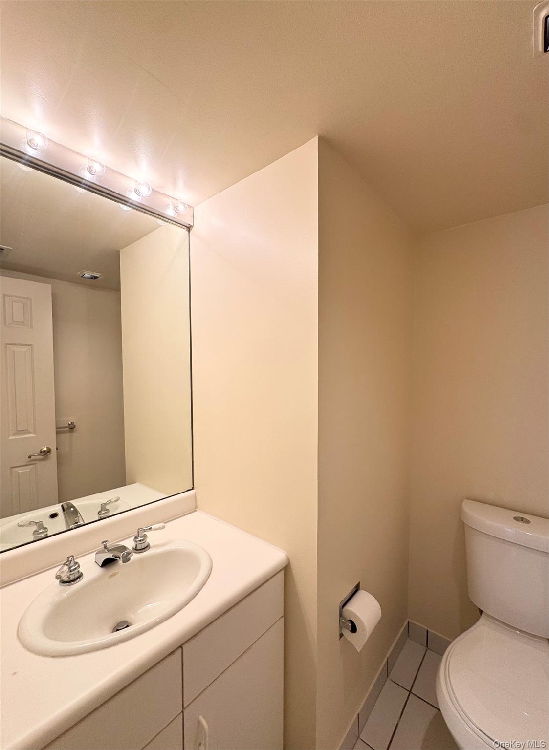 170 Schofield Street, Unit 2F Bronx, NY 10464 - Photo 7 of 11 a bathroom with a sink and a toilet