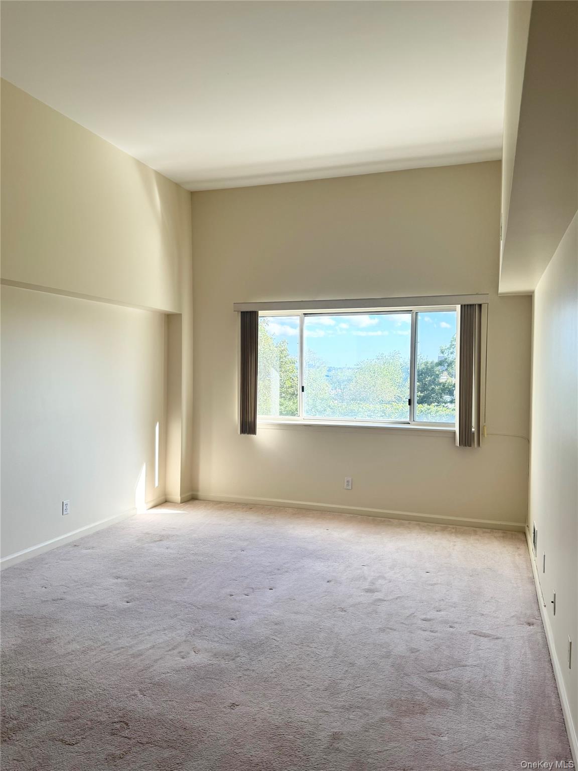 170 Schofield Street, Unit 2F Bronx, NY 10464 - Photo 9 of 11 an empty room with windows