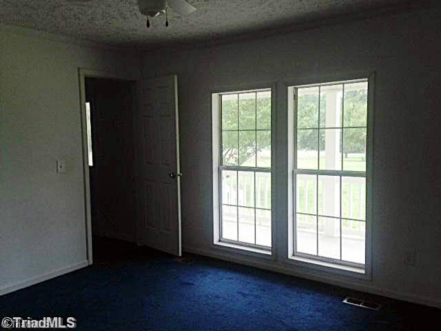 1957 Stockyard Road Staley, NC 27355 - Photo 6 of 14 Master Bedroom.