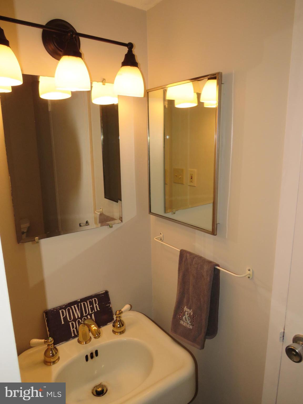 1709 Ivy Oak Square, Unit 18 Reston, VA 20190 - Photo 10 of 22 Main floor powder room