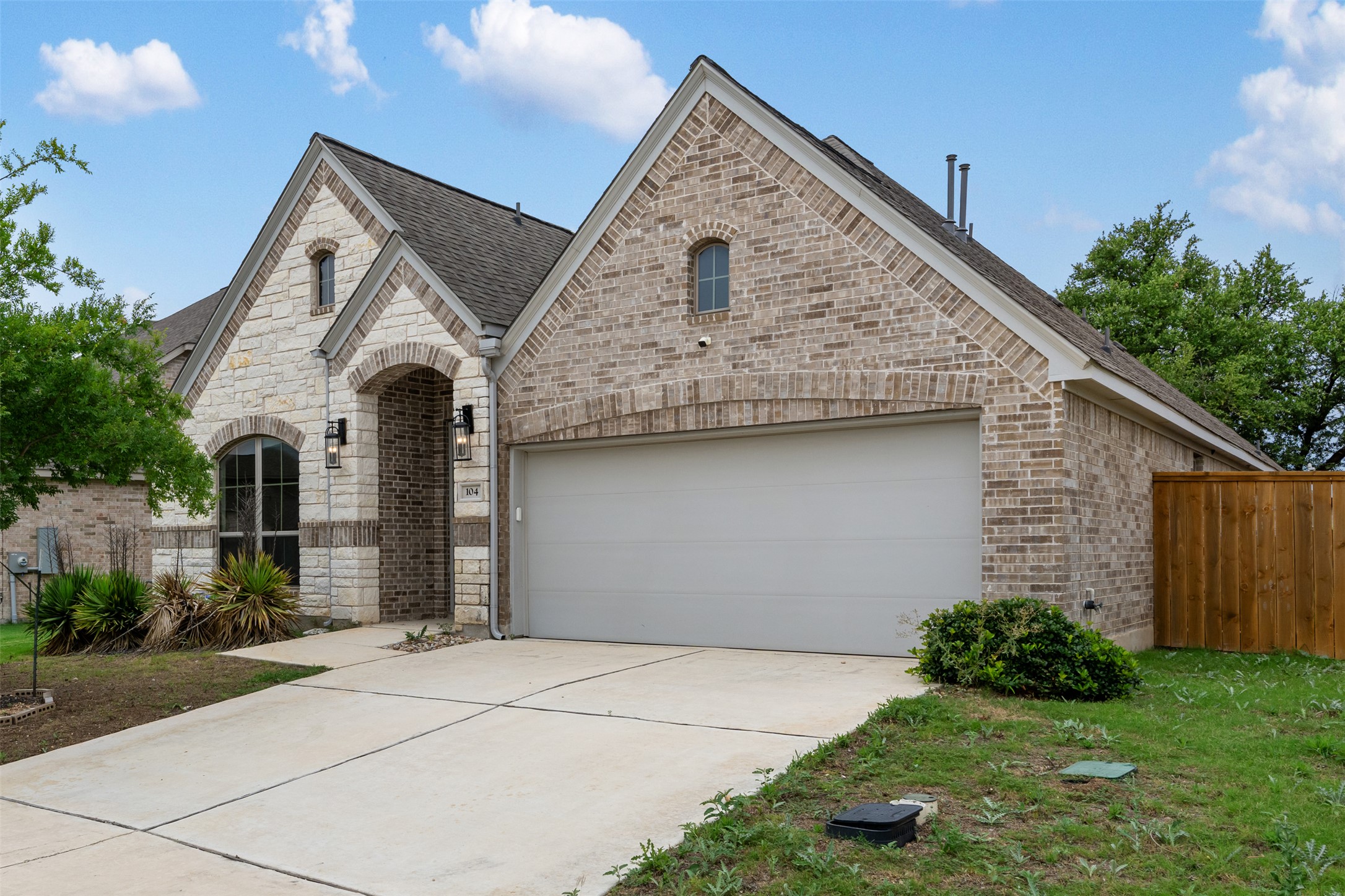 104 Anejo Bluff Georgetown, TX 78628 - Photo 2 of 40 front view of house with a yard