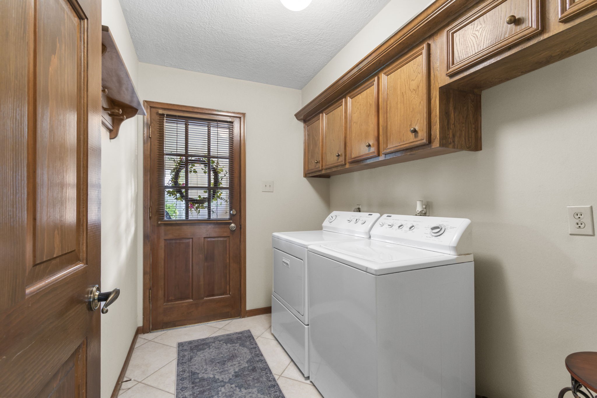 17710 Treeloch Lane Spring, TX 77379 - Photo 21 of 45 a utility room with dryer and washer