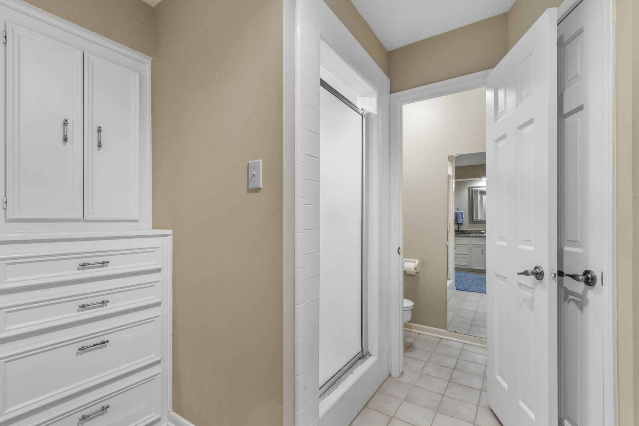 17710 Treeloch Lane Spring, TX 77379 - Photo 27 of 45 a view of a hallway with closet and bathroom