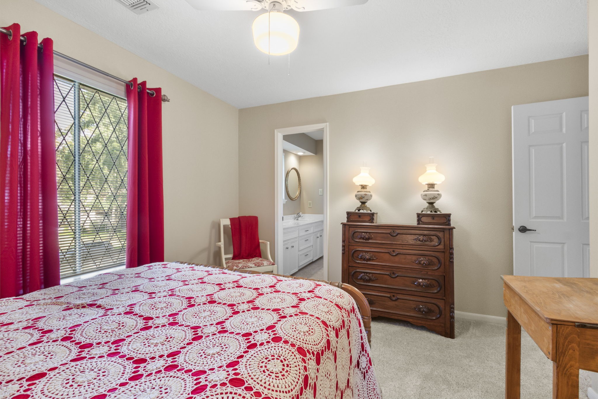 17710 Treeloch Lane Spring, TX 77379 - Photo 34 of 45 a bedroom with a bed and a dresser