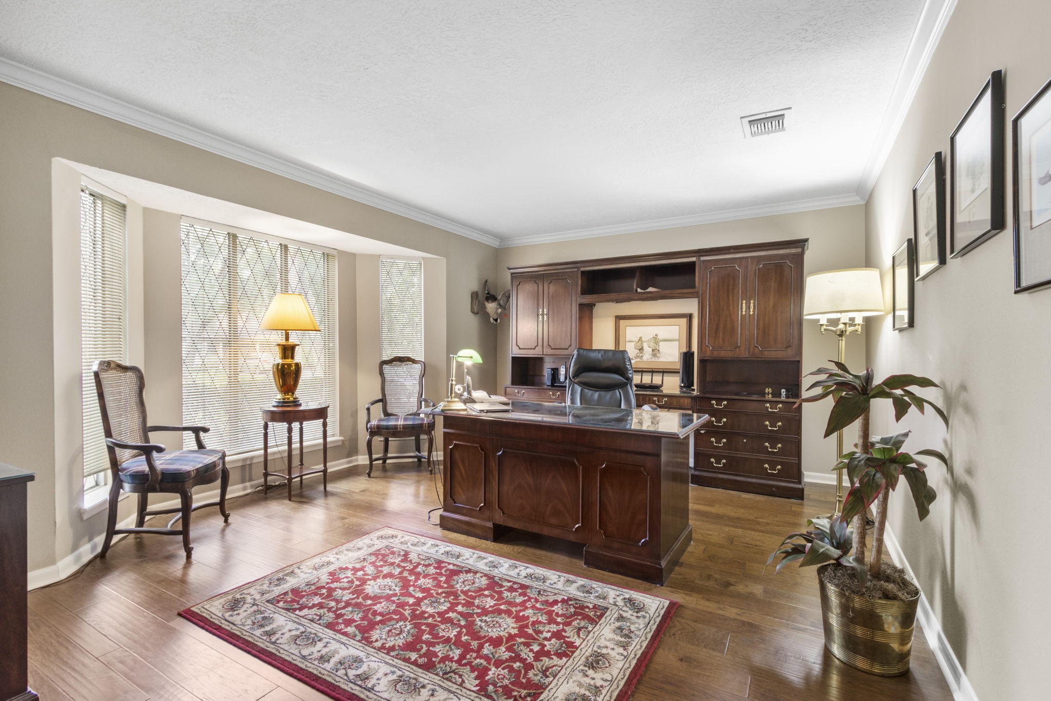 17710 Treeloch Lane Spring, TX 77379 - Photo 5 of 45 a living room with furniture a rug a flat screen tv and a table
