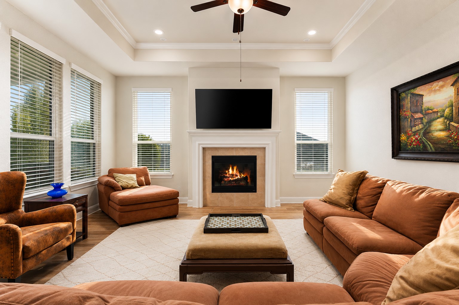112 Telegraph Lane Georgetown, TX 78633 - Photo 10 of 35 This view of the living room shows off the tray ceiling and fireplace.