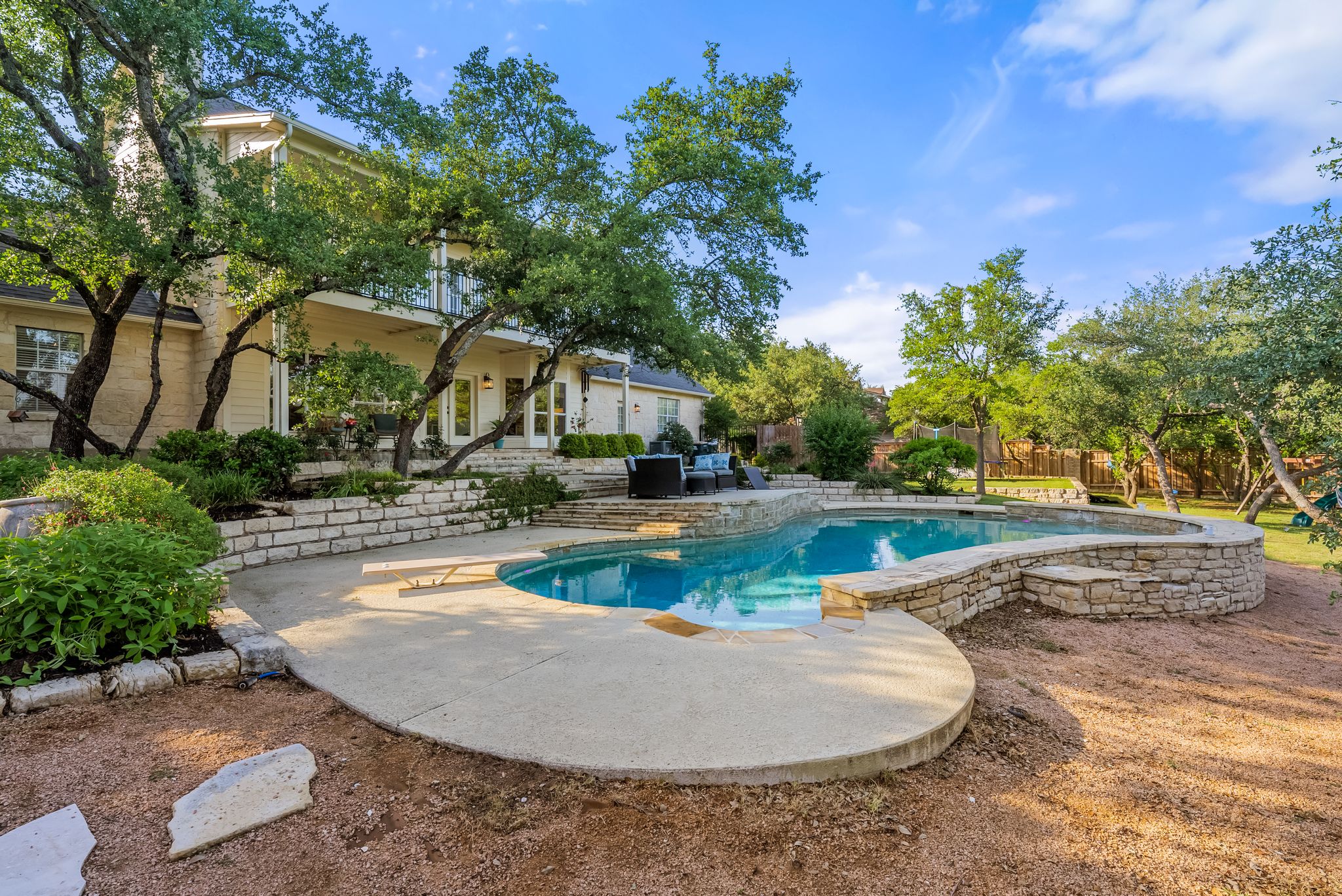 8909 Gallant Fox Road Austin, TX 78737 - Photo 1 of 1 Swimming pool with a patio and a fenced backyard