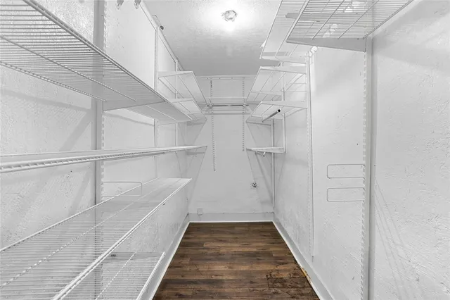 a view of a backyard with tree