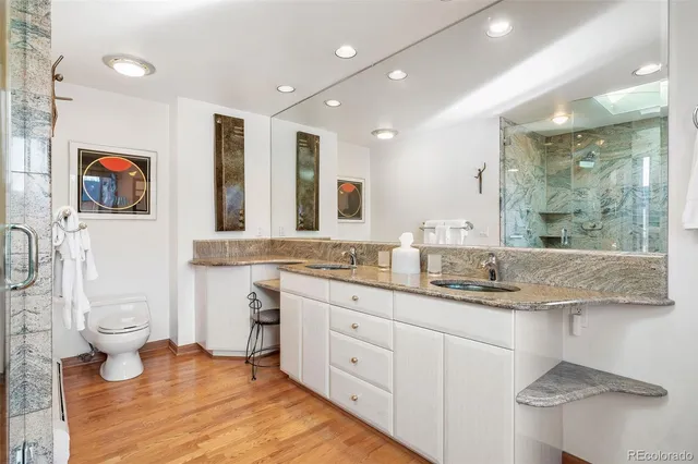 a bath room with a bath tub and a shower
