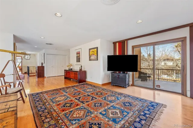 a outdoor space with a couch and a potted plant