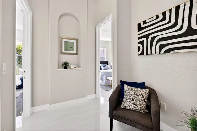 a bedroom with a bed and furniture